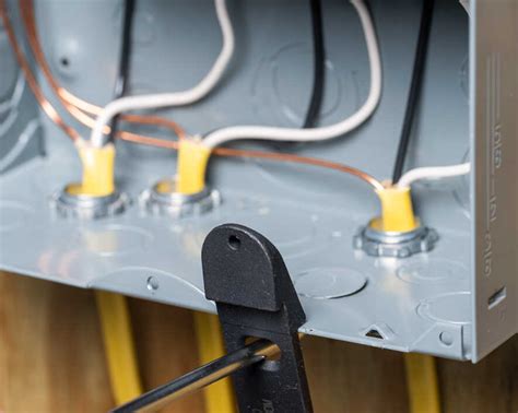 open knockouts in electrical panels